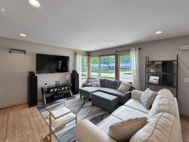 424 26th St, Minot, ND 58703 - living room with recessed lighting and light wood finished floors