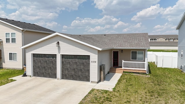 3328 NW 20th Ave, Minot, ND 58703 - view of front facade with an attached garage, driveway, a porch, and roof with shingles