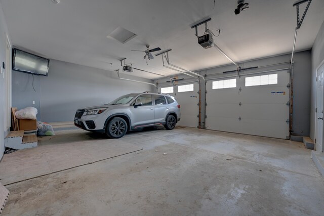 3328 NW 20th Ave, Minot, ND 58703 - garage featuring a garage door opener