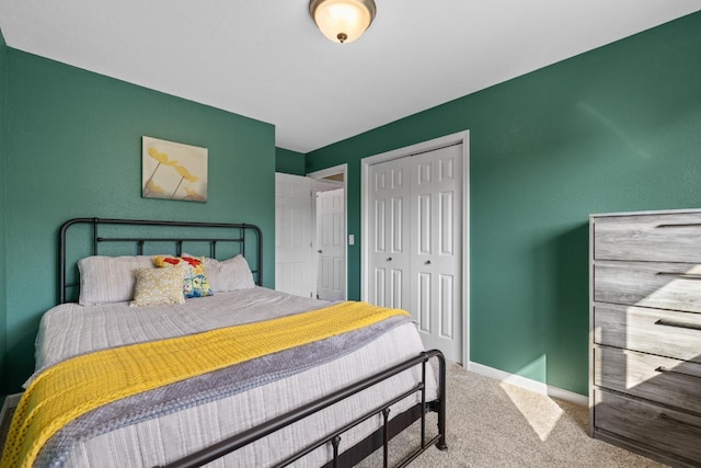 1925 10th St, Minot, ND 58703 - carpeted bedroom featuring a closet and baseboards