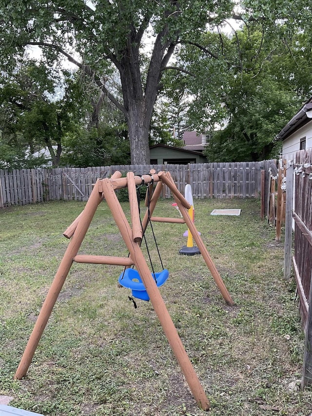 525 12th St, Minot, ND 58703 - view of yard featuring a playground