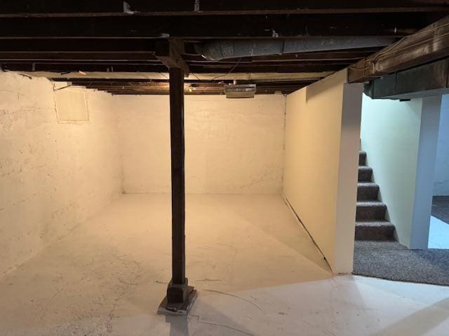 616 10th St, Minot, ND 58703 - unfinished below grade area with stairway