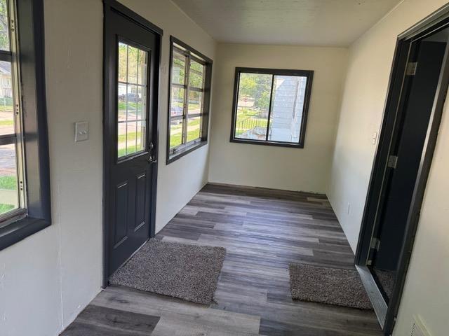 616 10th St, Minot, ND 58703 - view of unfurnished sunroom