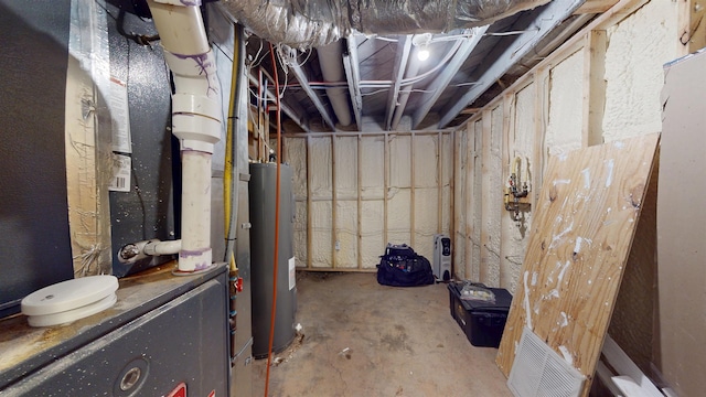 917 4th Ave, Minot, ND 58703 - unfinished basement with water heater