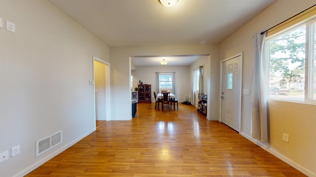 917 4th Ave, Minot, ND 58703 - foyer featuring light wood finished floors and baseboards