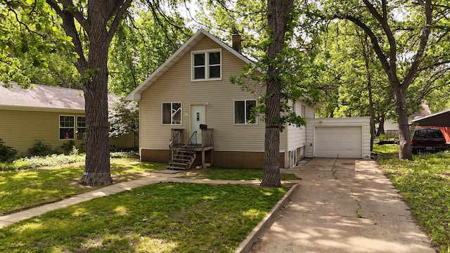 917 4th Ave, Minot, ND 58703 - view of front facade with a chimney, driveway, and a front lawn