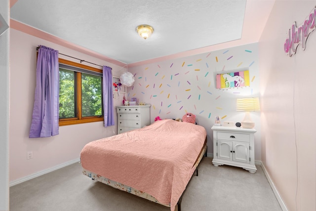 3304 12th St, Minot, ND 58701 - bedroom with light carpet and baseboards