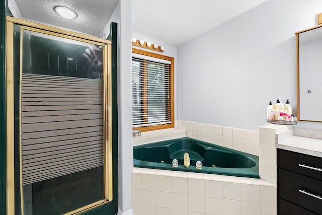 3304 12th St, Minot, ND 58701 - bathroom featuring a shower stall, vanity, and a jetted tub