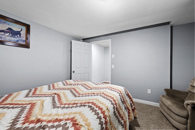 3304 12th St, Minot, ND 58701 - carpeted bedroom with baseboards