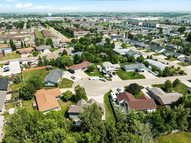 3304 12th St, Minot, ND 58701 - aerial view of property and surrounding area featuring nearby suburban area