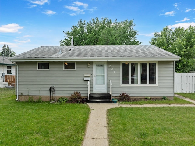 224 19th St, Minot, ND 58701 - ranch-style home with roof with shingles
