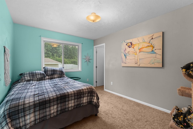 1705 SW Evergreen Ave, Minot, ND 58701 - bedroom featuring carpet and a textured ceiling