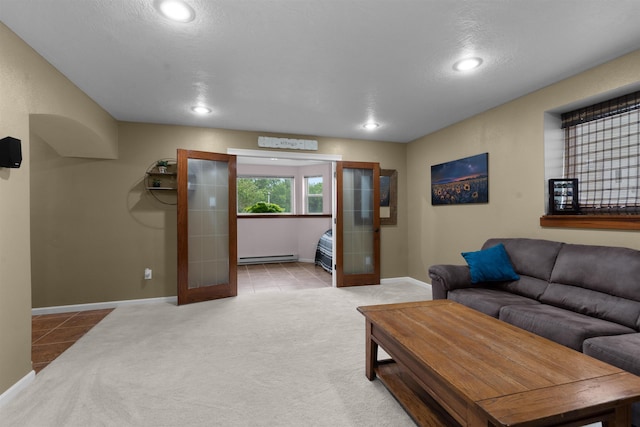 1705 SW Evergreen Ave, Minot, ND 58701 - carpeted living area with recessed lighting, tile patterned floors, a baseboard heating unit, and french doors