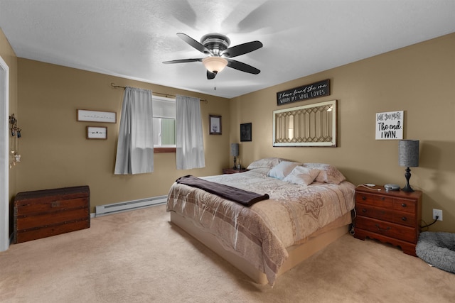 1705 SW Evergreen Ave, Minot, ND 58701 - bedroom featuring baseboard heating, carpet flooring, and a ceiling fan