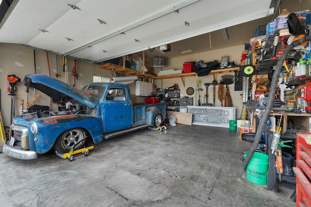 1705 SW Evergreen Ave, Minot, ND 58701 - garage with a workshop area