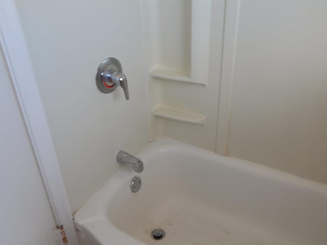2014 4th St, Minot, ND 58703 - bathroom featuring shower / bath combination