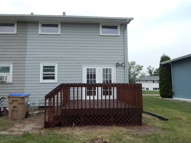 2014 4th St, Minot, ND 58703 - rear view of property featuring a wooden deck and a yard