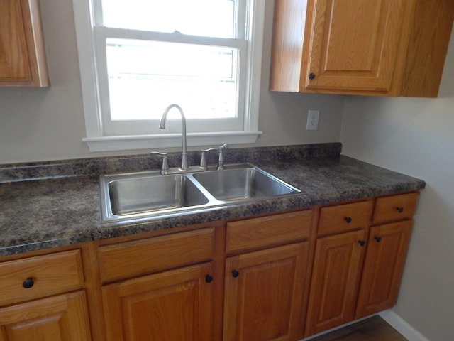 2014 4th St, Minot, ND 58703 - kitchen with dark countertops