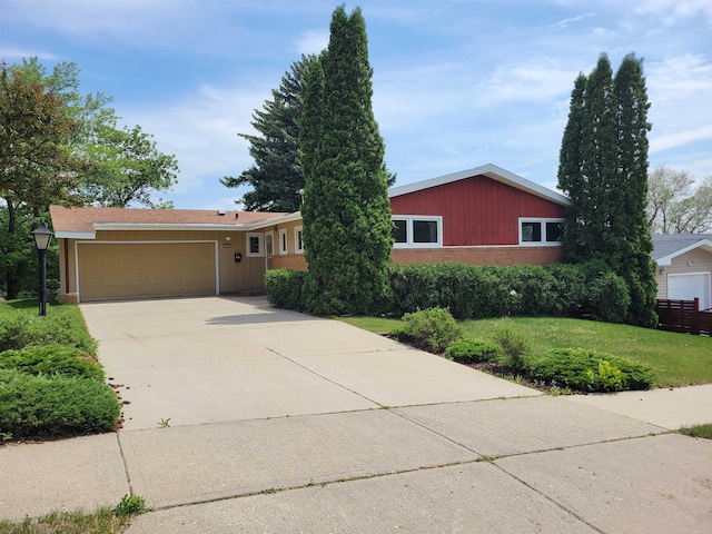 1000 21st St, Minot, ND 58703 - single story home with an attached garage, concrete driveway, a front yard, and brick siding