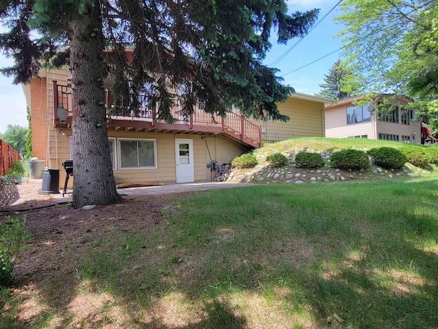 1000 21st St, Minot, ND 58703 - view of front of home with a wooden deck