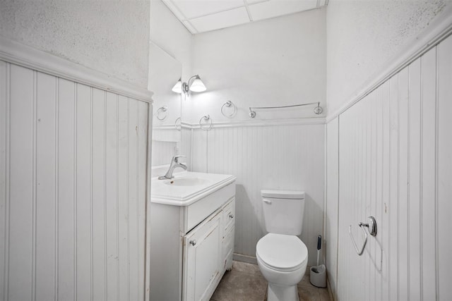 306 2nd St, Towner, ND 58788 - bathroom featuring vanity and wainscoting