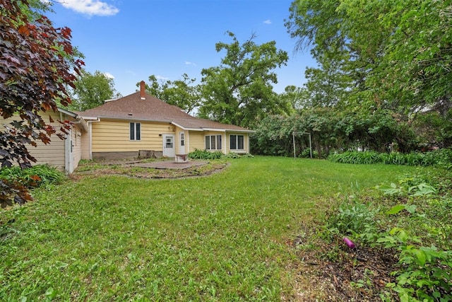 306 2nd St, Towner, ND 58788 - view of grassy yard featuring a patio