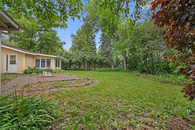 306 2nd St, Towner, ND 58788 - view of grassy yard with a patio