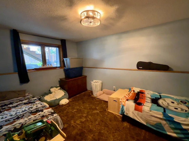 3 30th St, Minot, ND 58701 - bedroom featuring carpet floors and a textured ceiling
