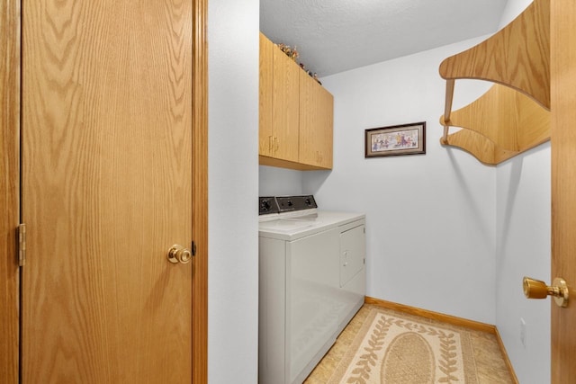 2009 14th St, Minot, ND 58703 - washroom featuring independent washer and dryer and cabinet space