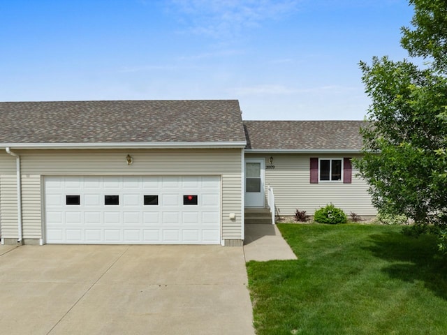 2009 14th St, Minot, ND 58703 - view of front of property with driveway, a front yard, an attached garage, and a shingled roof