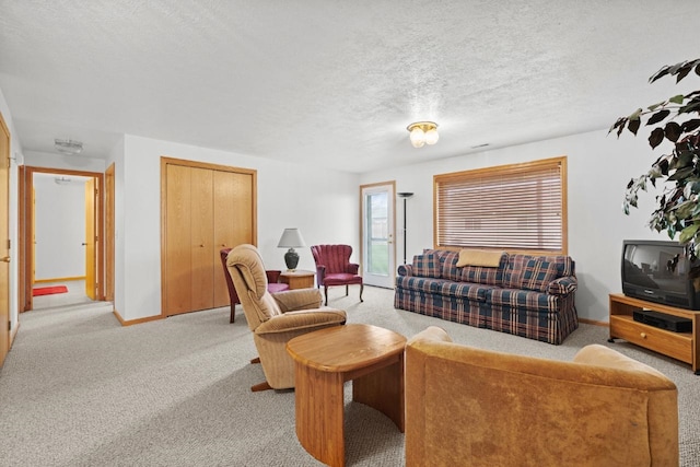 2009 14th St, Minot, ND 58703 - living room featuring light colored carpet and a textured ceiling