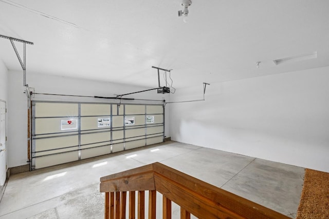 2009 14th St, Minot, ND 58703 - garage featuring a garage door opener