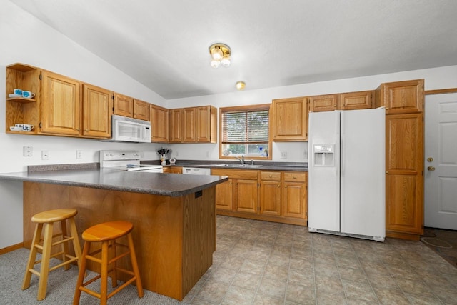 2009 14th St, Minot, ND 58703 - kitchen with white appliances, dark countertops, vaulted ceiling, a peninsula, and open shelves