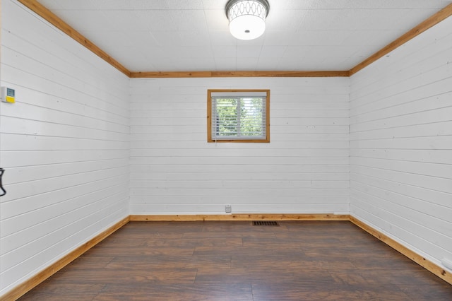 211 W 3rd St, Velva, ND 58790 - empty room featuring dark wood-style flooring