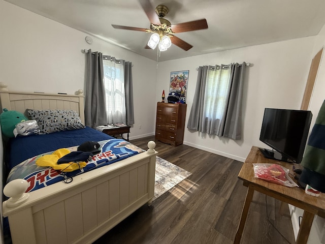 3301 SE 1st St, Minot, ND 58701 - bedroom with dark wood finished floors and ceiling fan