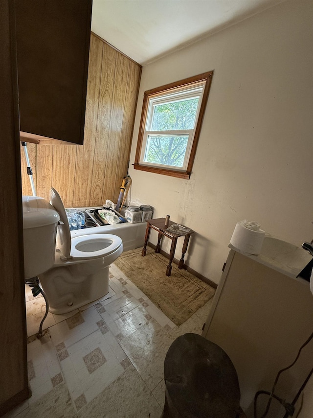 3301 SE 1st St, Minot, ND 58701 - bathroom featuring tile patterned floors and a bath