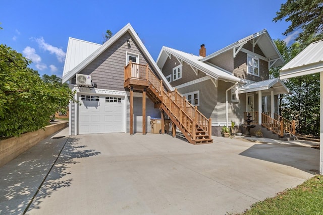 519 4th St, Minot, ND 58701 - view of front facade featuring driveway, a chimney, and stairway