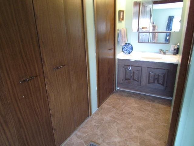 83 Hahns Bay Rd, Lake Metigoshe, ND 58318 - bathroom with vanity