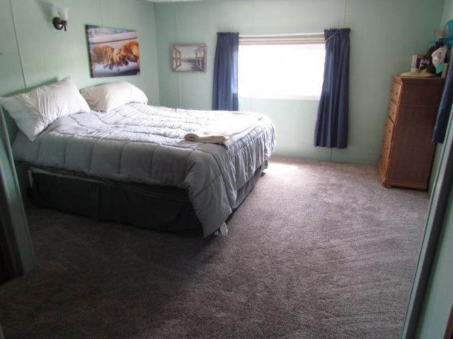 83 Hahns Bay Rd, Lake Metigoshe, ND 58318 - view of carpeted bedroom