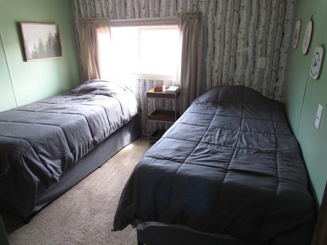 83 Hahns Bay Rd, Lake Metigoshe, ND 58318 - view of carpeted bedroom