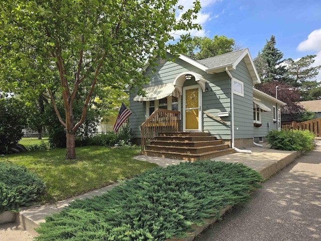209 University Ave, Minot, ND 58703 - view of bungalow-style home