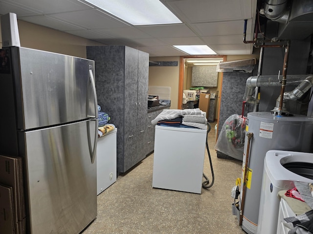 209 University Ave, Minot, ND 58703 - finished basement featuring freestanding refrigerator, washer / clothes dryer, gas water heater, and a drop ceiling