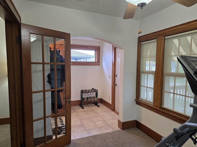 209 University Ave, Minot, ND 58703 - entrance foyer featuring arched walkways and ceiling fan