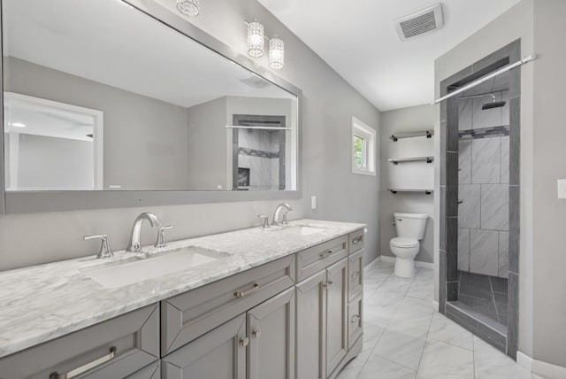 615 18th Ave, Minot, ND 58701 - full bath featuring marble look tiles, double vanity, and a stall shower