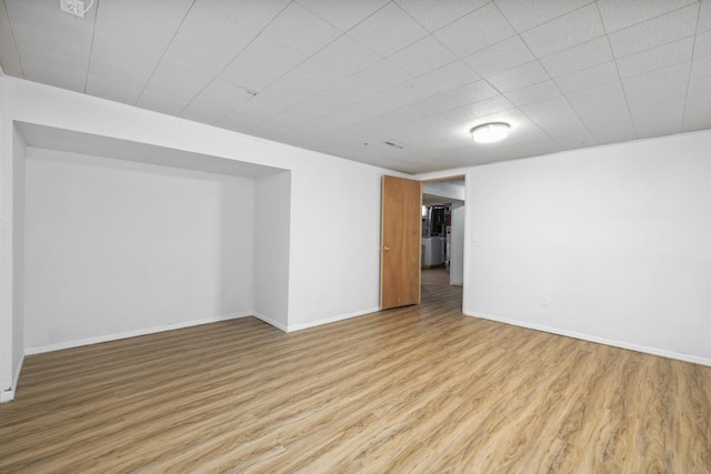 615 18th Ave, Minot, ND 58701 - unfurnished room featuring wood finished floors