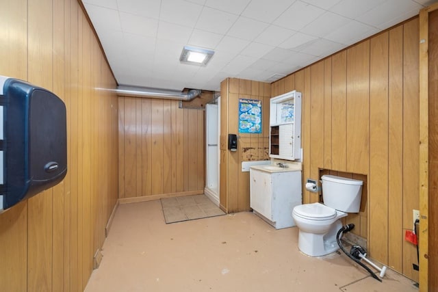 615 18th Ave, Minot, ND 58701 - full bath featuring wooden walls and concrete flooring