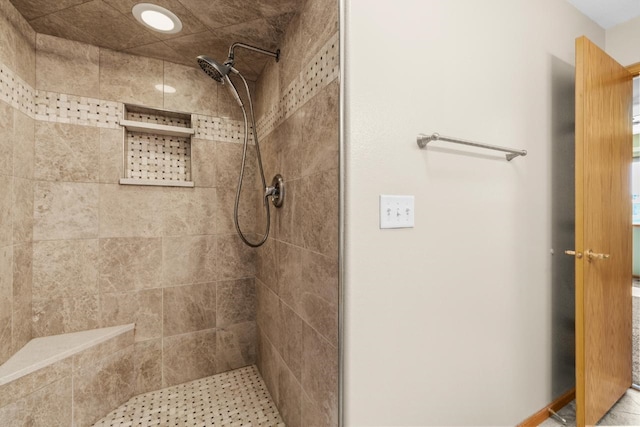 1949 24th St, Minot, ND 58701 - bathroom featuring a tile shower