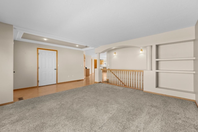 1949 24th St, Minot, ND 58701 - empty room featuring carpet flooring, recessed lighting, and crown molding