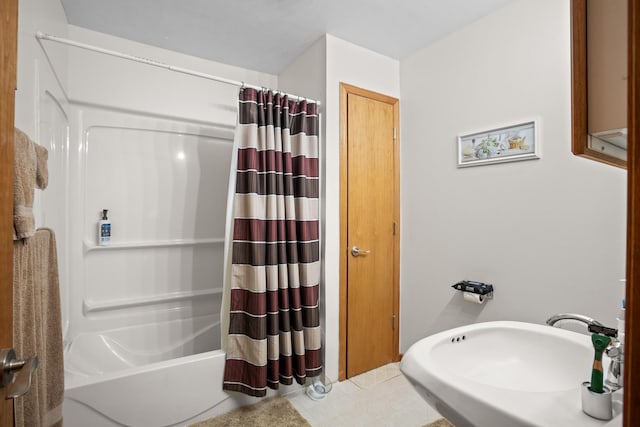 2710 66th St, Minot, ND 58703 - full bathroom featuring shower / tub combo and a sink