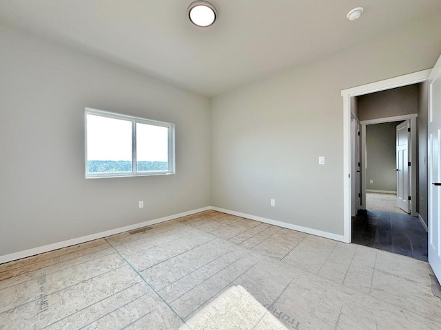1609 Heights Ave, Burlington, ND 58722 - empty room featuring a smoke detector and baseboards
